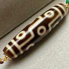 9-Eye Dzi bead on Waven  Cord Necklace