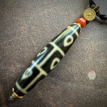 Buddha’s Heart 9 -Eye dZi bead on Waven  Cord Necklace