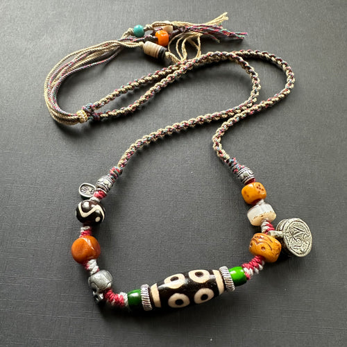 Vintage 8-eye Tibetan Dzi bead with Handmade Cord Necklace
