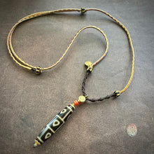 Buddha’s Heart 9 -Eye dZi bead on Waven  Cord Necklace