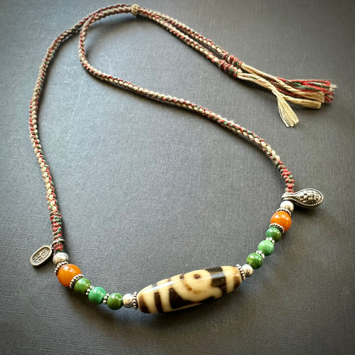 Vintage Tibetan 2-Eye dZi bead with Turquoise on Handmade Cord Necklace