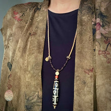Buddha’s Heart 9 -Eye dZi bead on Waven  Cord Necklace
