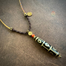 Buddha’s Heart 9 -Eye dZi bead on Waven  Cord Necklace